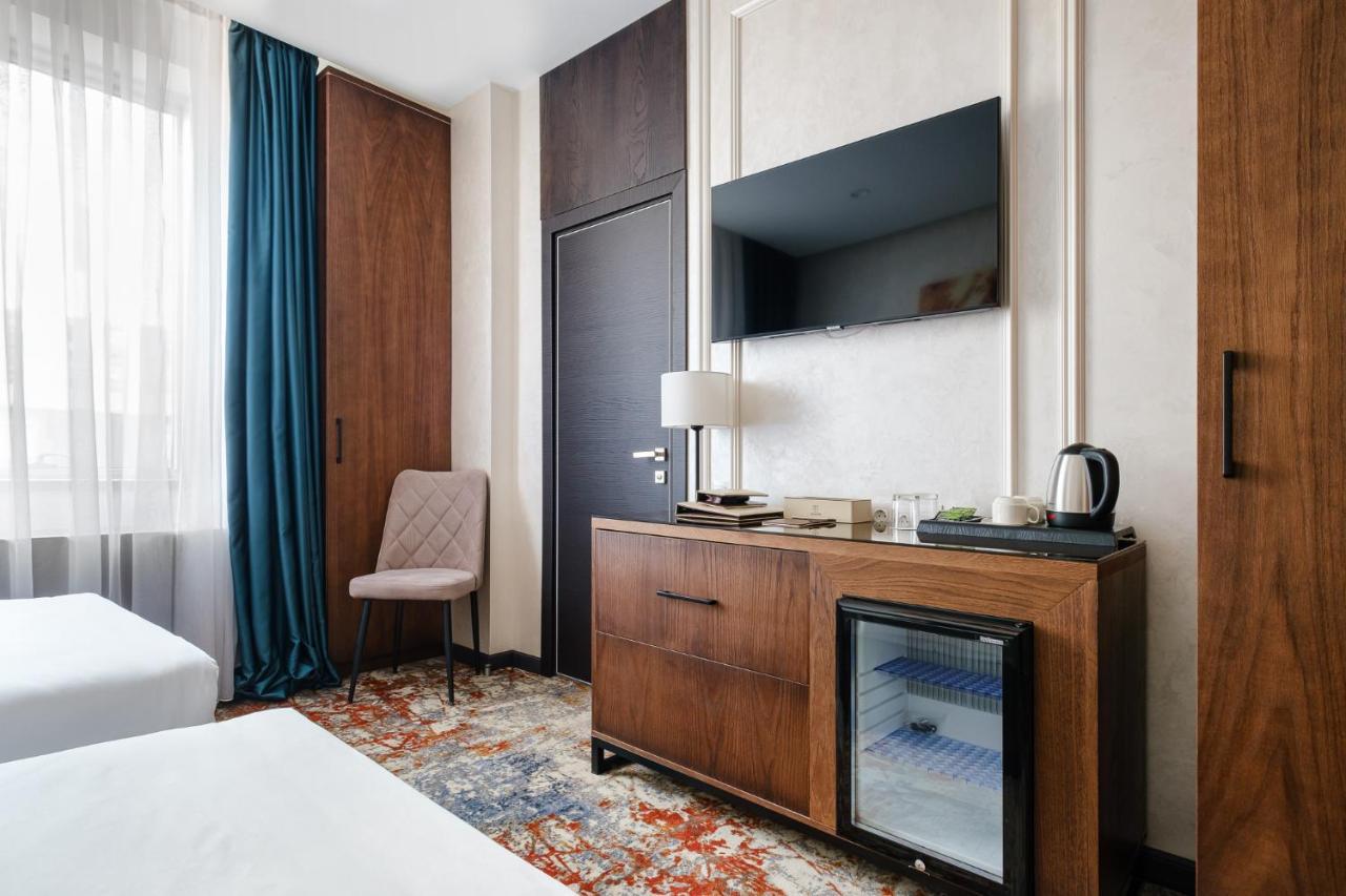 Grand Mildom Hotel Almaty Bagian luar foto
