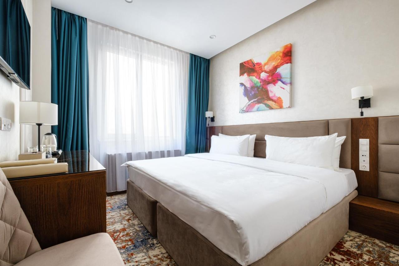 Grand Mildom Hotel Almaty Bagian luar foto