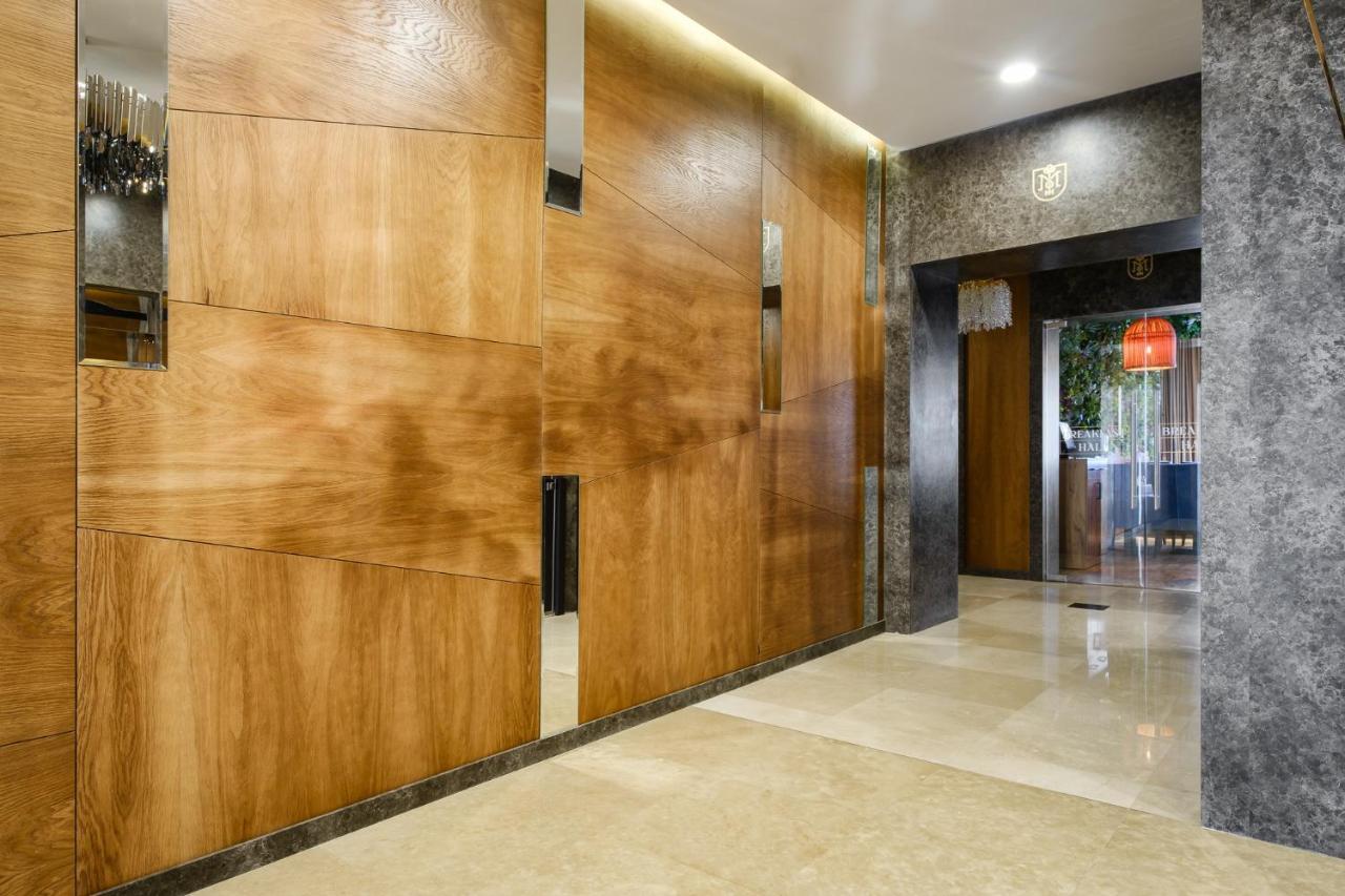 Grand Mildom Hotel Almaty Bagian luar foto