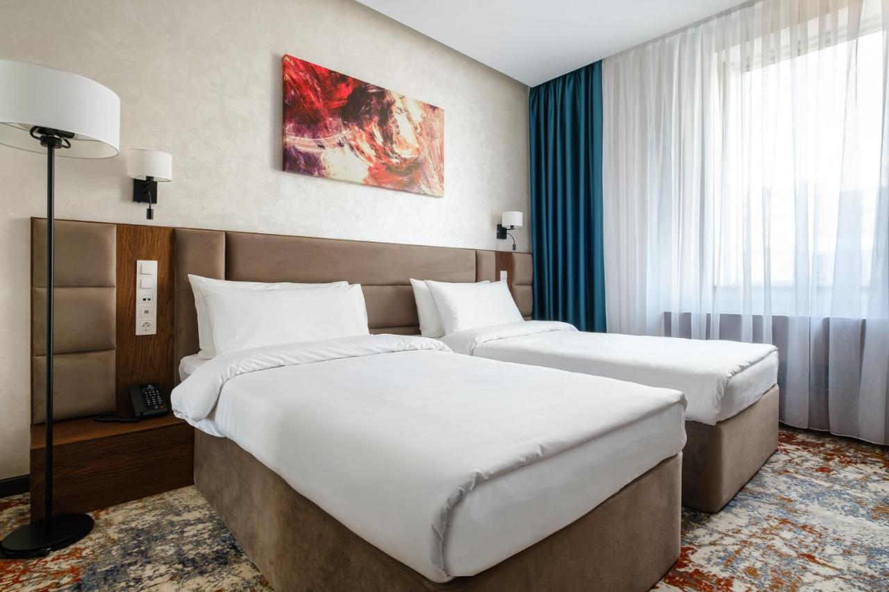 Grand Mildom Hotel Almaty Bagian luar foto