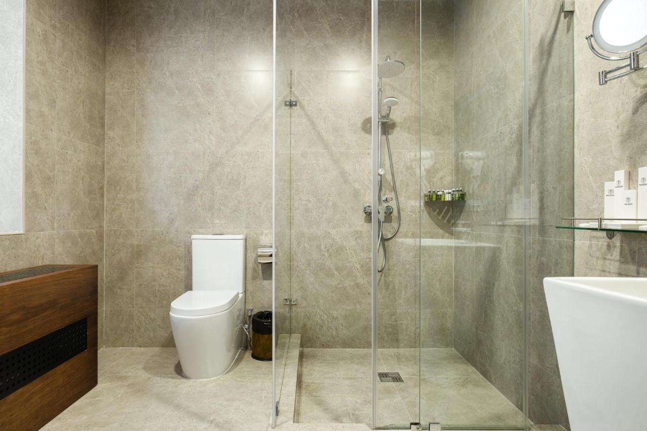 Grand Mildom Hotel Almaty Bagian luar foto