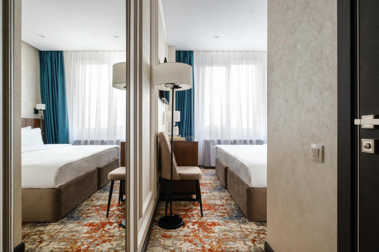 Grand Mildom Hotel Almaty Bagian luar foto