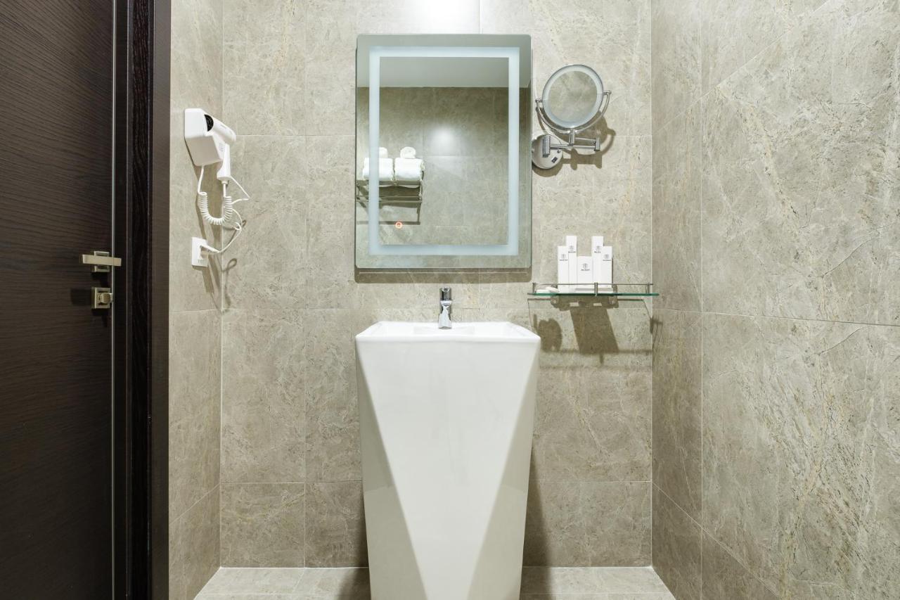 Grand Mildom Hotel Almaty Bagian luar foto