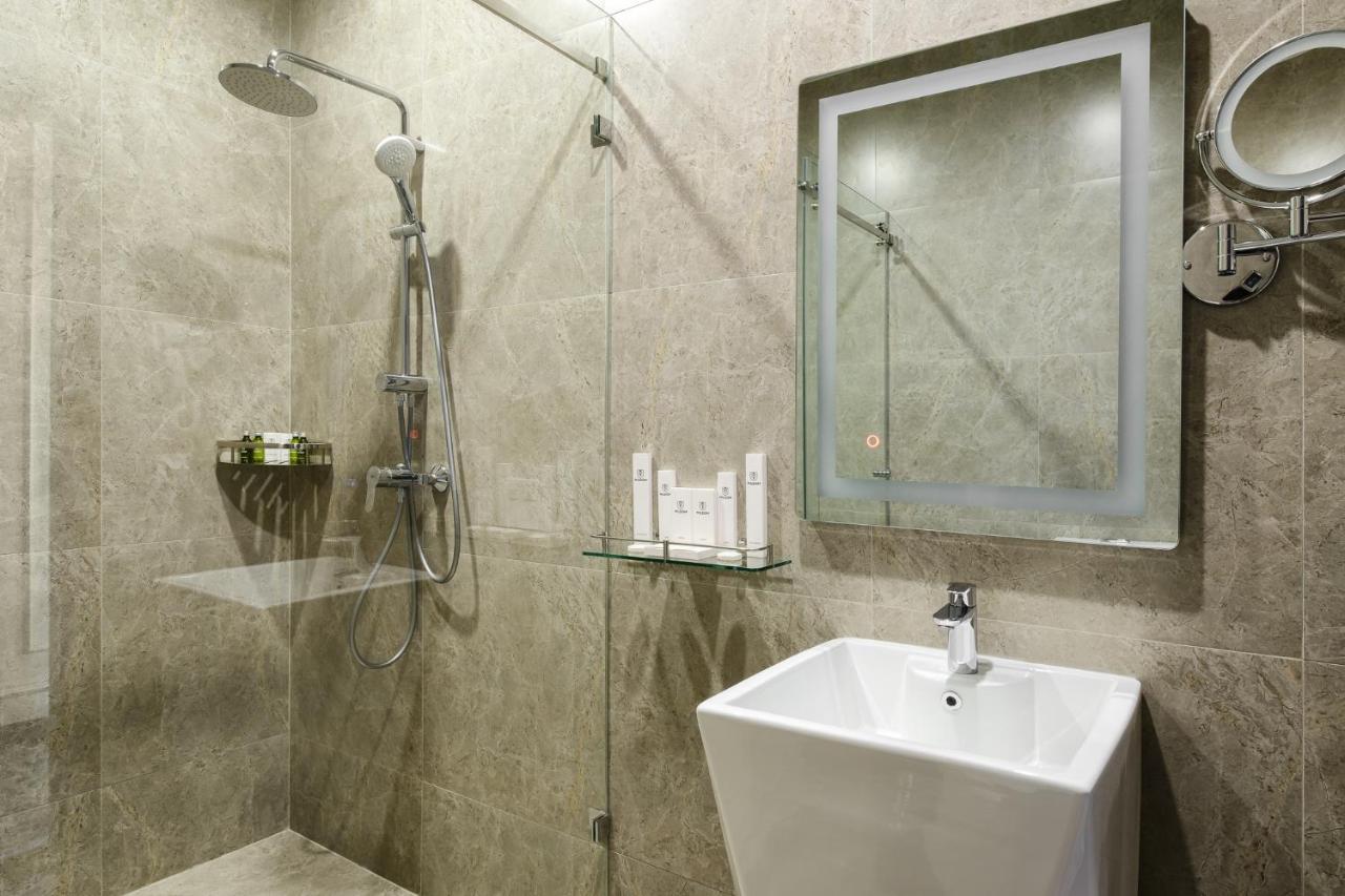 Grand Mildom Hotel Almaty Bagian luar foto